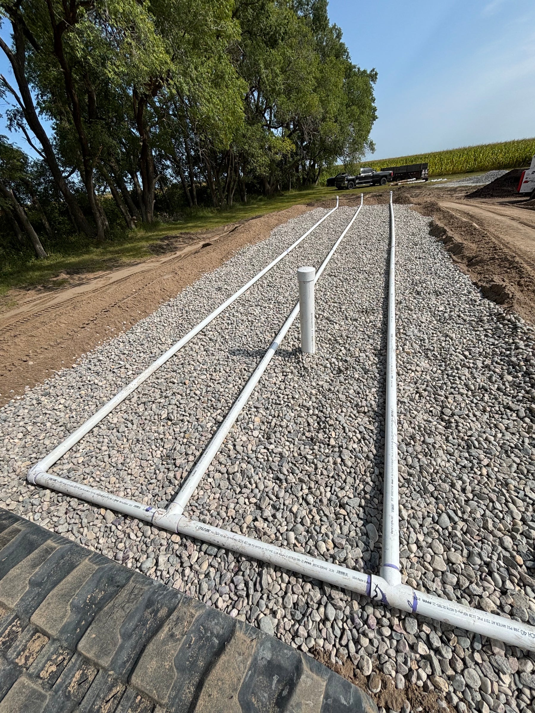 Excavation crew installing a residential septic system near Underwood, MN